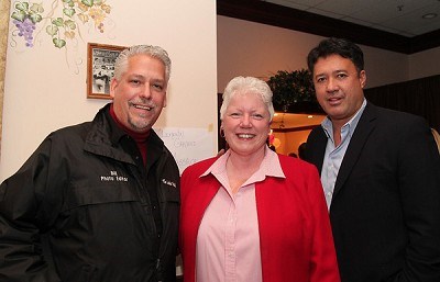 Leader Herald photgrapher Bill Trojann, Publisher Pat Beck, and Ron Darling