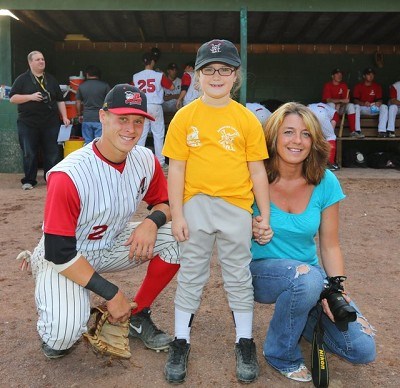 Shortstop Ronnie Bernick (Canisius) with his baseball buddy