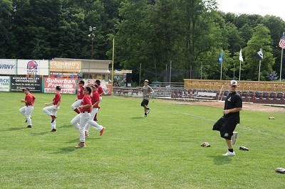 Alex DeBellis and Tom Kain work with the Junior Mohawks