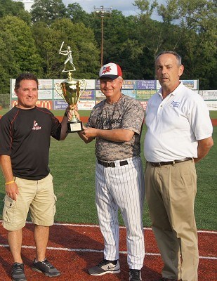 GM Brian Spagnola and Head Coach Keith Griffin accept the Patriot Federal Bank Cup for winning the season series against the Mohawk Valley Diamond Dawgs