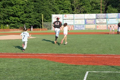 First Basemen Brendan Tracy of Fairfield takes the field with his baseball buddies.