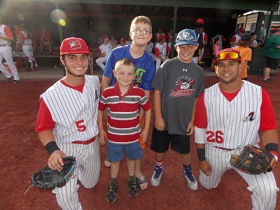 Tyler Frank and Tristen Carranza with their Baseball Buddies