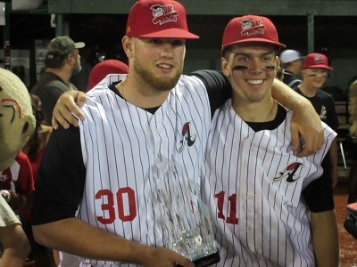 Jeff Belge and Chris Givin with the trophy.