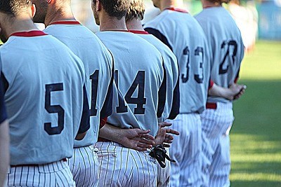 The Mohawks stand for the National Anthem