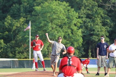 Former intern Kyle Kesses throws out a first pitch. Kyle now works for the New York Yankees.