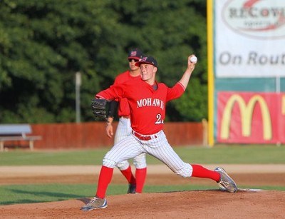 Dylan Dwyer (Kentucky) finishes his warm-up pitches