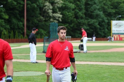 Colin Gay returns to the dugout after BP