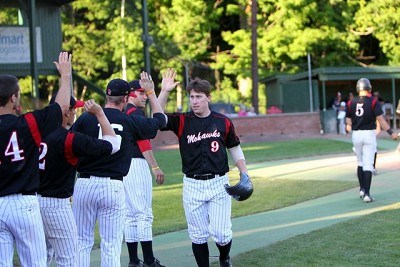 John Nogowski (Florida State) is congratulated by his teammated after scoring on a ball hit by Brian Ruby (Binghamton) in the 1st inning