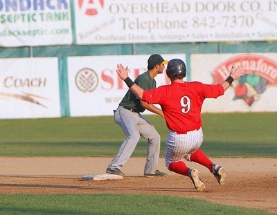 John Nogowski (Florida State) tags up and slides into second after Dylan Smith hit a sacrifice fly to center field