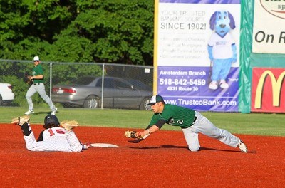 Hunter Tackett (Auburn) slides into second base as Colin Hawk (Indianapolis) tries to apply the tag. 