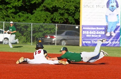 Hunter Tackett (Auburn) slides into second base as Colin Hawk (Indianapolis) tries to apply the tag. 