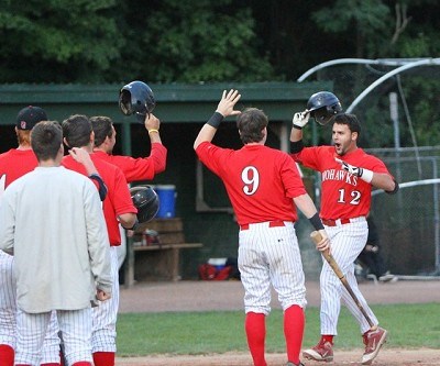 John Sansone (Florida State) touches home after hitting a 2-run home run in the third inning