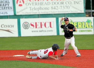 Kevin Guthrie of Brown slides out of the way as Watertown turns a double play in the seventh inning.