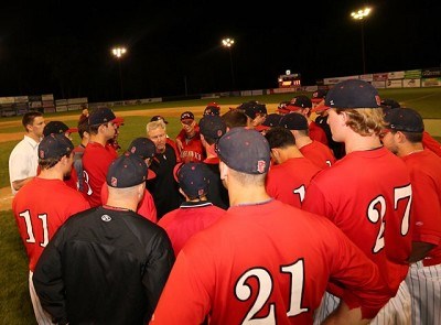 Head coach Keith Griffin addresses the team after the game.