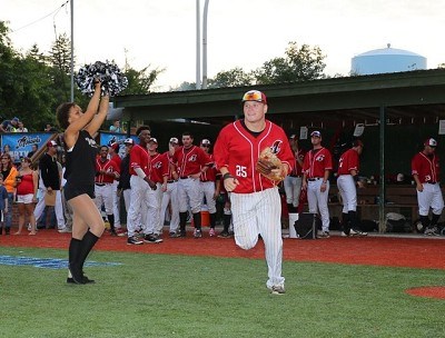 Third basemen Tom Kain of Lynn takes the field.