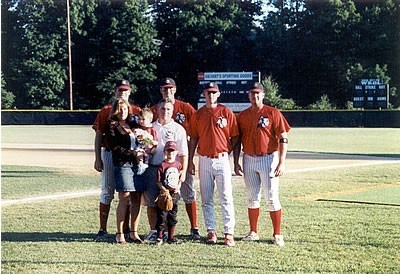 Mohawks General Manager Brian Spagnola and his family pose with Georgia's Blake Cannady, Hawaii's Jon Combs,Stanford's Rex Petrill and Alden Crissey of Davidson. 